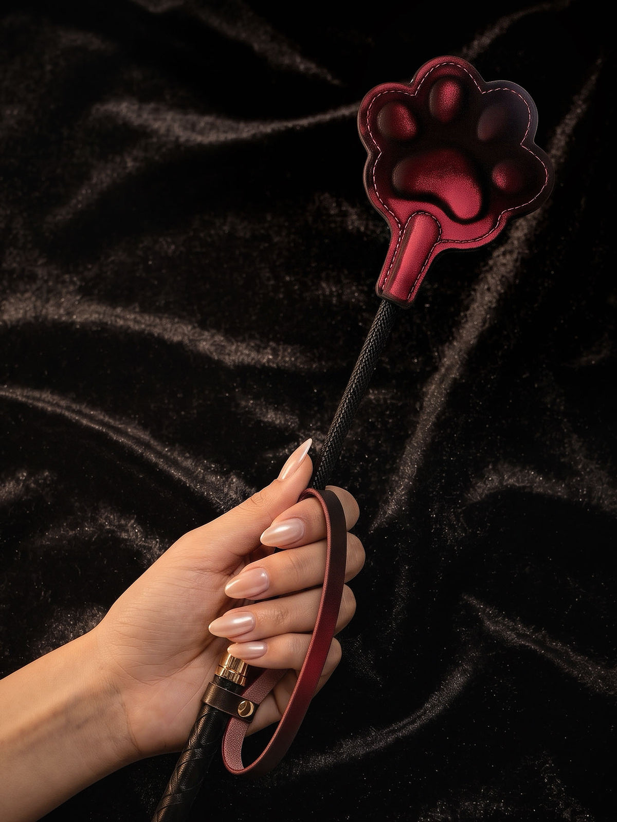 BDSM Paddle, paw print leather paddle held in hand, playful accessory for Date Ideas Funny