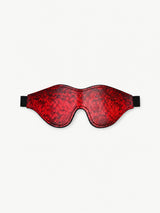 red snake print leather eye mask ergonomic contour design black elastic strap soft faux leather sleeping eye cover isolated white background fashion sleep accessory