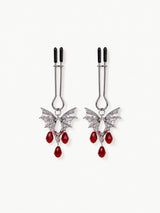 gothic bat design nipple clamps antique silver finish hanging red teardrop crystal beads black rubber tips decorative fashion accessory isolated on white background