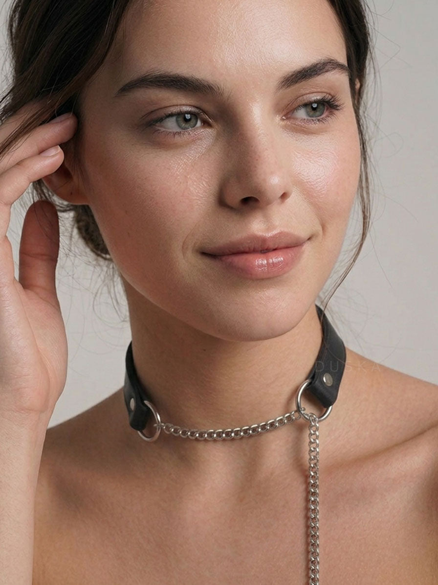 Pulling Fashion and Fun Choker with a long chain drop, worn as an edgy statement necklace