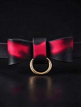 Thermochromic leather choker necklace bow closeup, red black gradient temperature color changing leather bow with gold D ring, fashion leather collar accessory