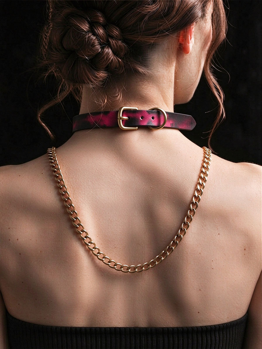 Thermochromic leather choker necklace on model back view, pink black gradient temperature color changing collar with gold adjustable buckle and D ring, thick gold curb chain fashion accessory